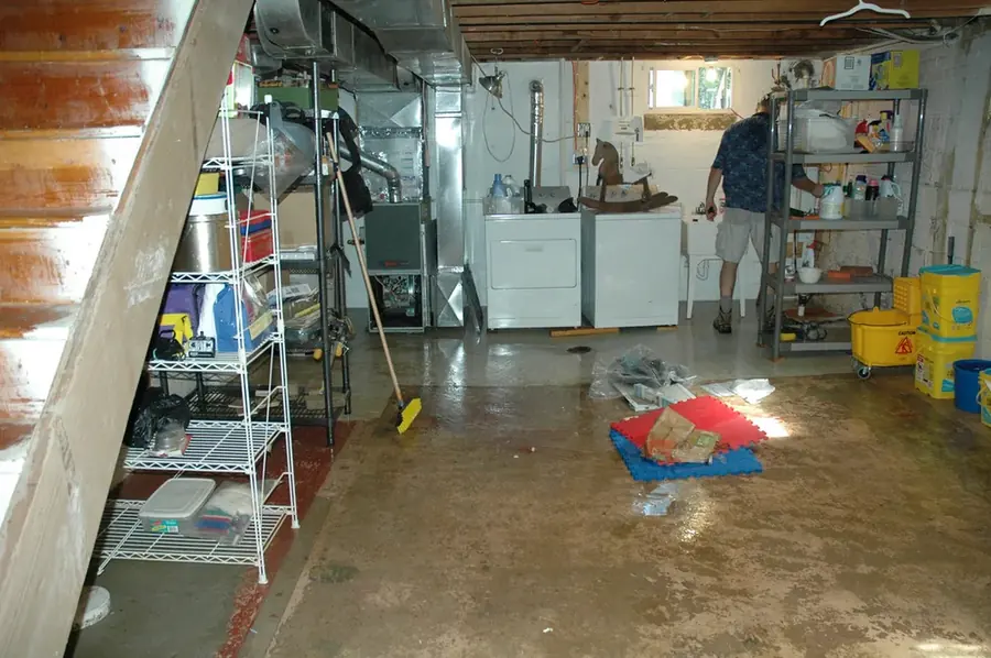 Appliance supply line leak flooding a Torrance, CA utility room