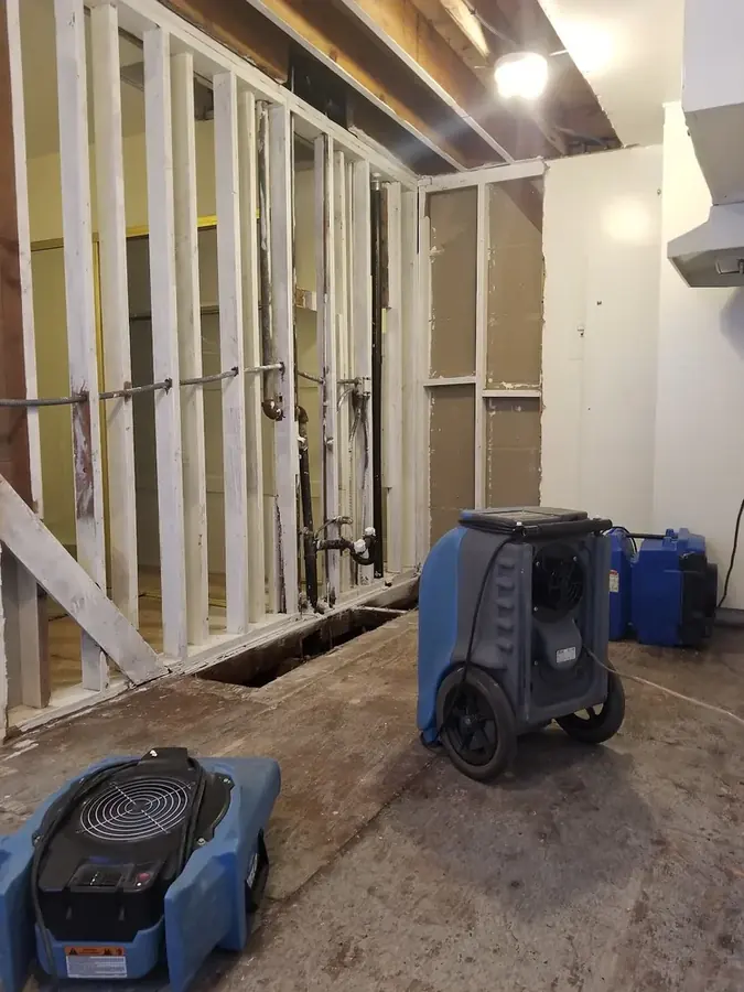Water damage from a burst pipe being dried in a Torrance, CA home