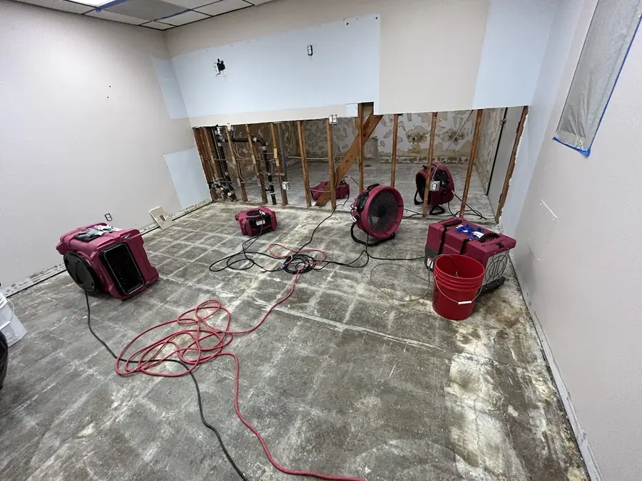 Air movers drying a slab leak in a Torrance, CA home