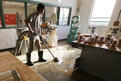 Technician extracting standing water in a Torrance, CA home